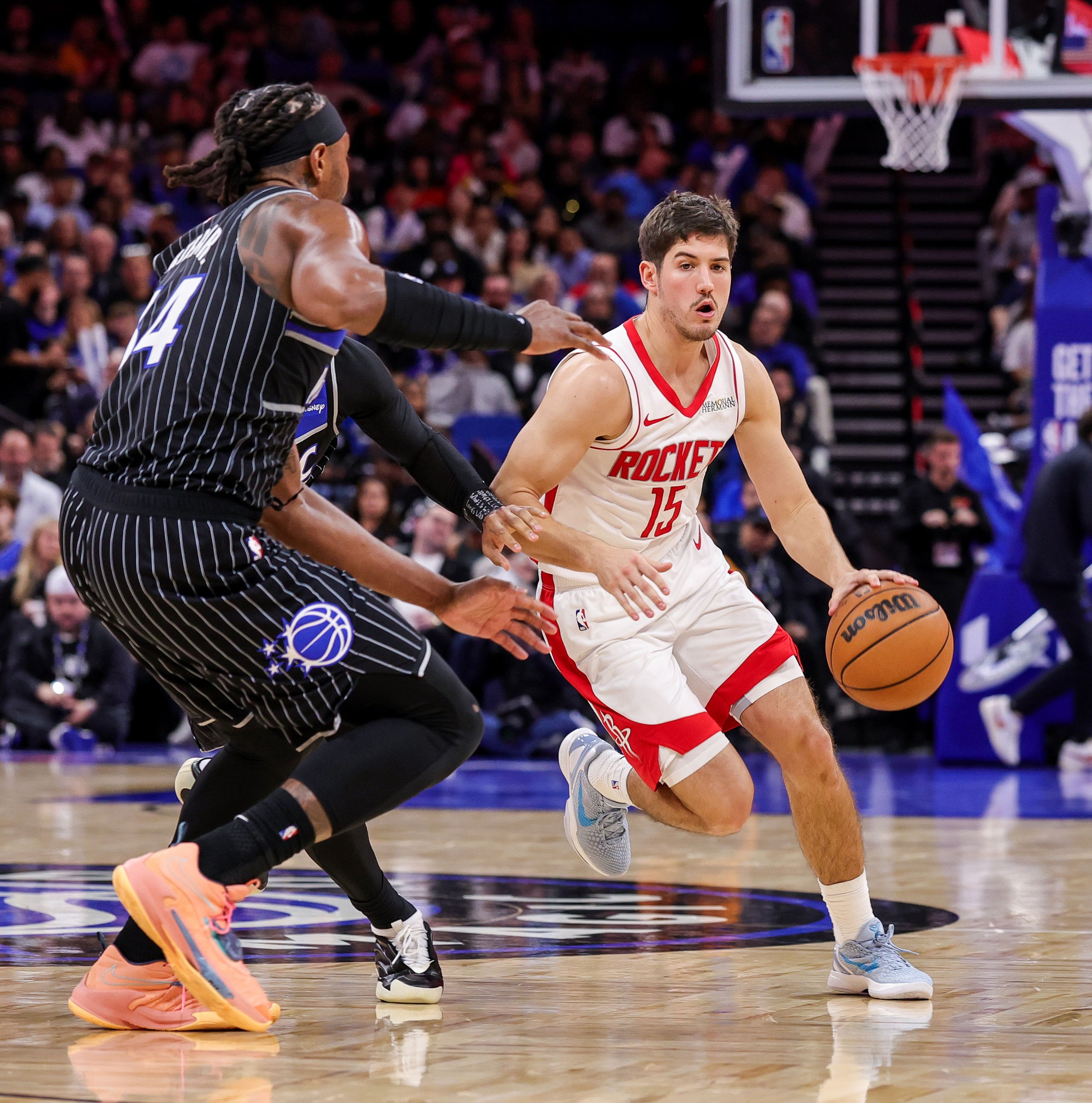 Rockets Reed the room late, beat Magic 113-108